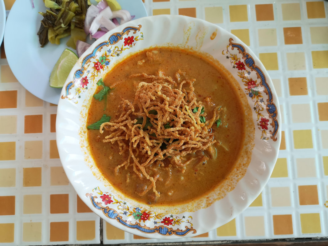 A perfect bowl of Khao Soi at Khun Yai in Chiang Mai.